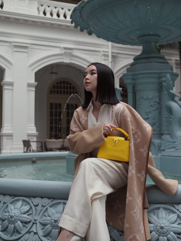 Singapore Fashion Blogger and Digital Creative Willabelle Ong @willamazing wearing Louis Vuitton giant monogram jacquard wrap coat and LV Capucines bag in Bouton d’Or Yellow