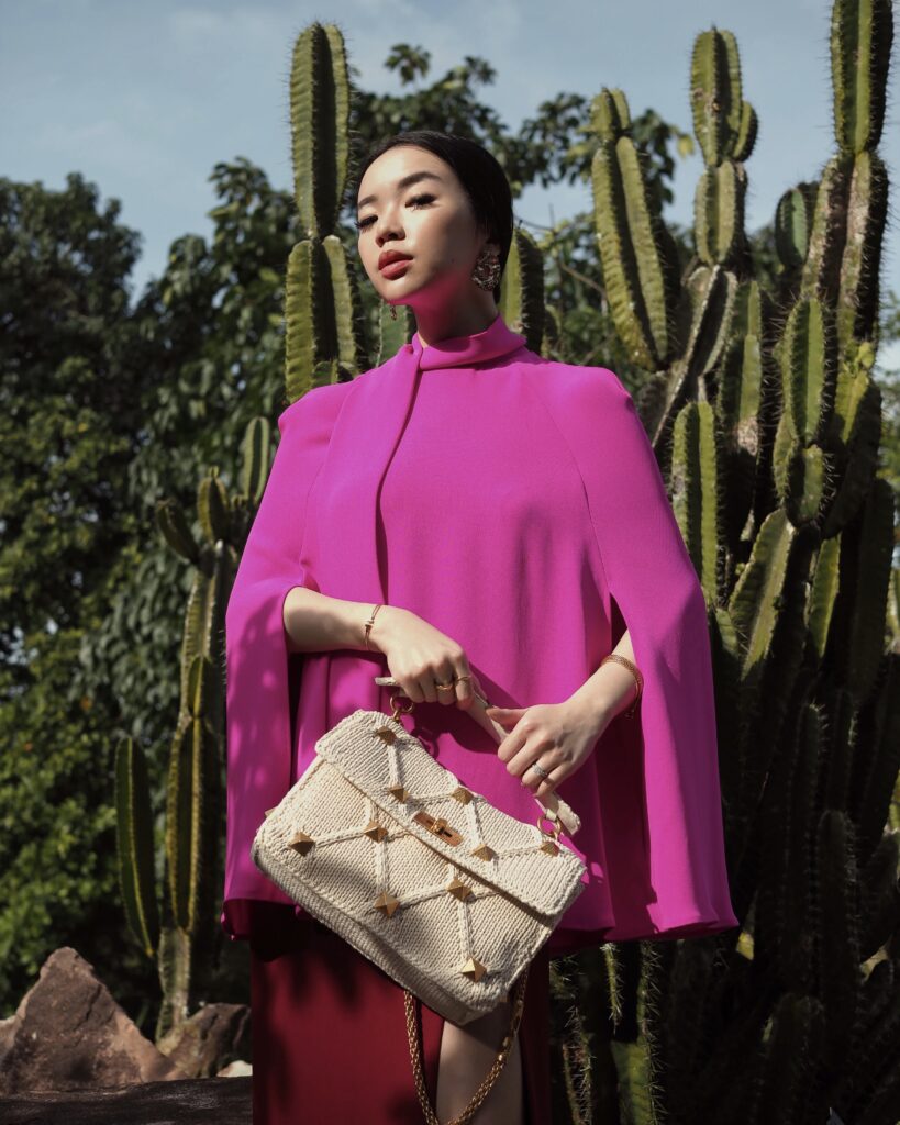 Singapore Fashion Blogger and Digital Creative Willabelle Ong @willamazing dressed in Valentino Resort Pink Cape Top with Valentino Roman Study Knitted and Woven Bag