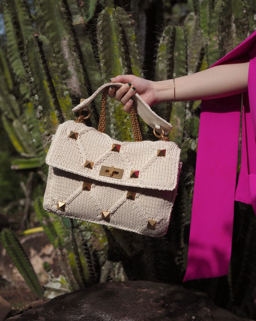 Singapore Fashion Blogger and Digital Creative Willabelle Ong @willamazing dressed in Valentino Resort Pink Cape Top with Valentino Roman Study Knitted and Woven Bag